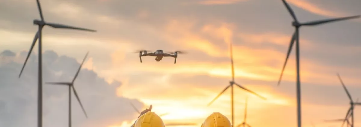 Cover of 'Web intelligence for measuring emerging economic trends: the drone industry report,' showing two construction workers pointing at a drone