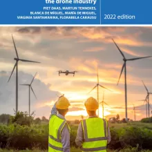 Cover of 'Web intelligence for measuring emerging economic trends: the drone industry report,' showing two construction workers pointing at a drone